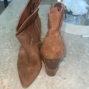 Brown suede booties. In good condition. Heel is about 4 inches.
